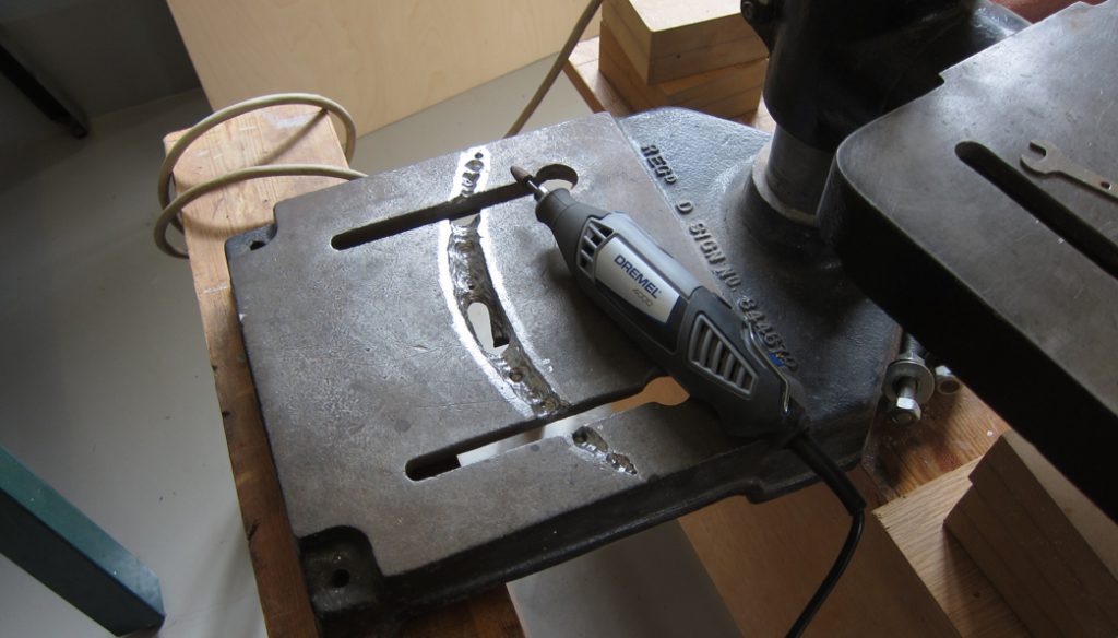 A drill base stand with a large gouge prior to undergoing rebuild and refurbish using Industrial Metal Epoxy Paste