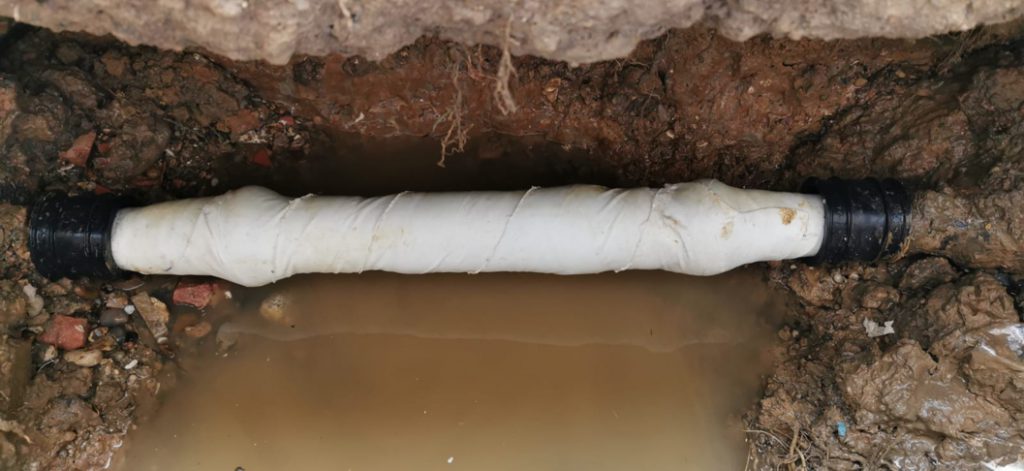 SylWrap HD Pipe Repair Bandage encompassed the entire section of water supple pipe after the reconnect had taken place