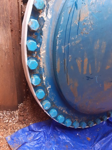 Pipe flange plate on a 1800mm steel wastewater line which had been suffering from tree root ingress