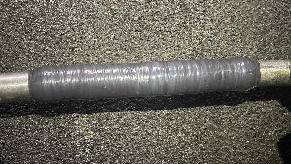Wrap & Seal Pipe Burst Tape applied as part of the repair of a stainless steel heating pipe in a farm biodigester tank