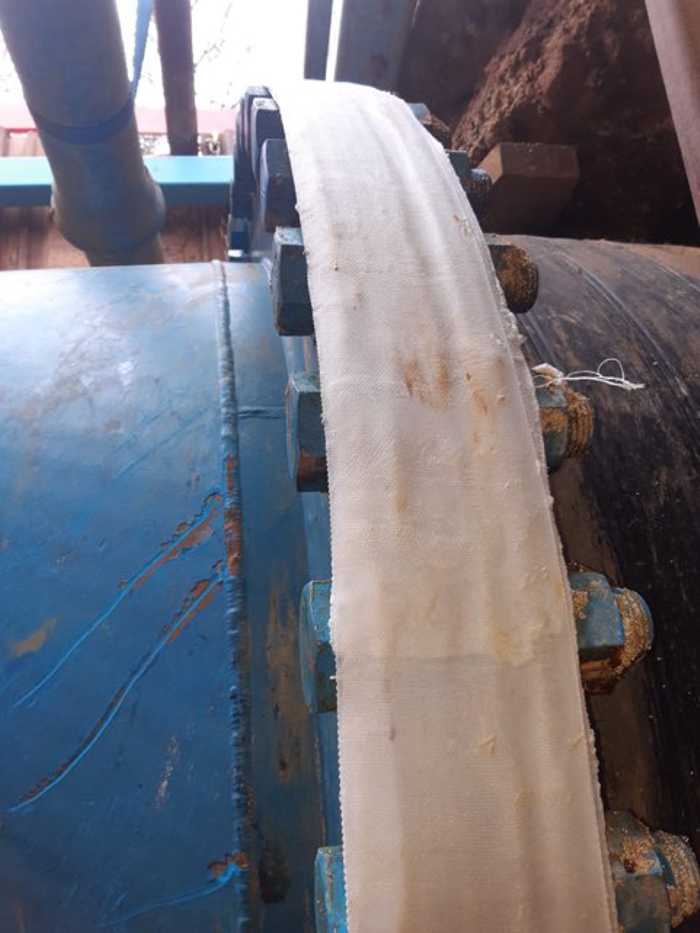 SylWrap HD Pipe Repair Bandage wrapped around a flange plate to prevent tree root ingress into a pipe