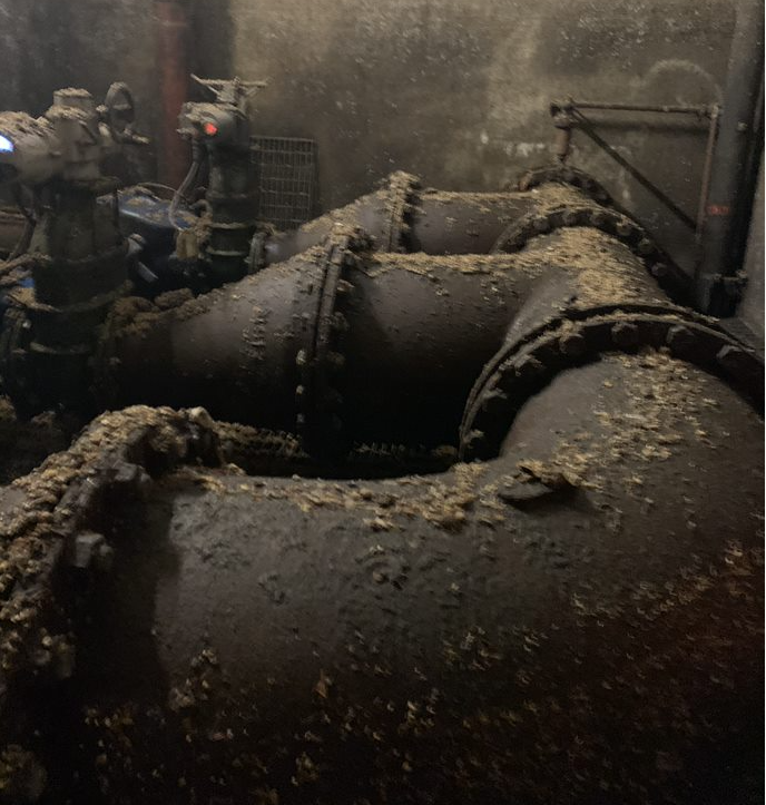 Ductile pipe system in an underground pumping station showing early signs of weakening before corrosion protection measures were taken