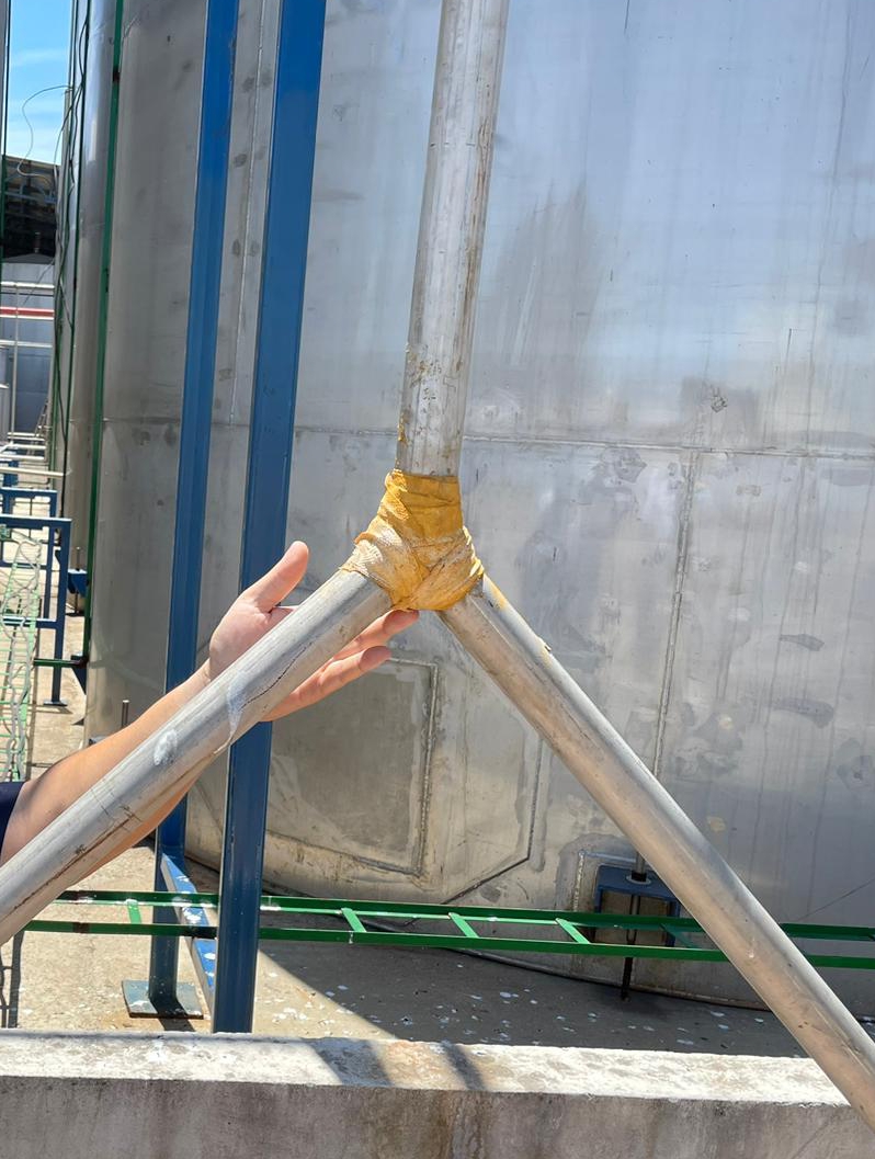 Leaking Y-joint pipe sealed using a SylWrap Pipe Repair Kit at a sugar mill in Costa Rica