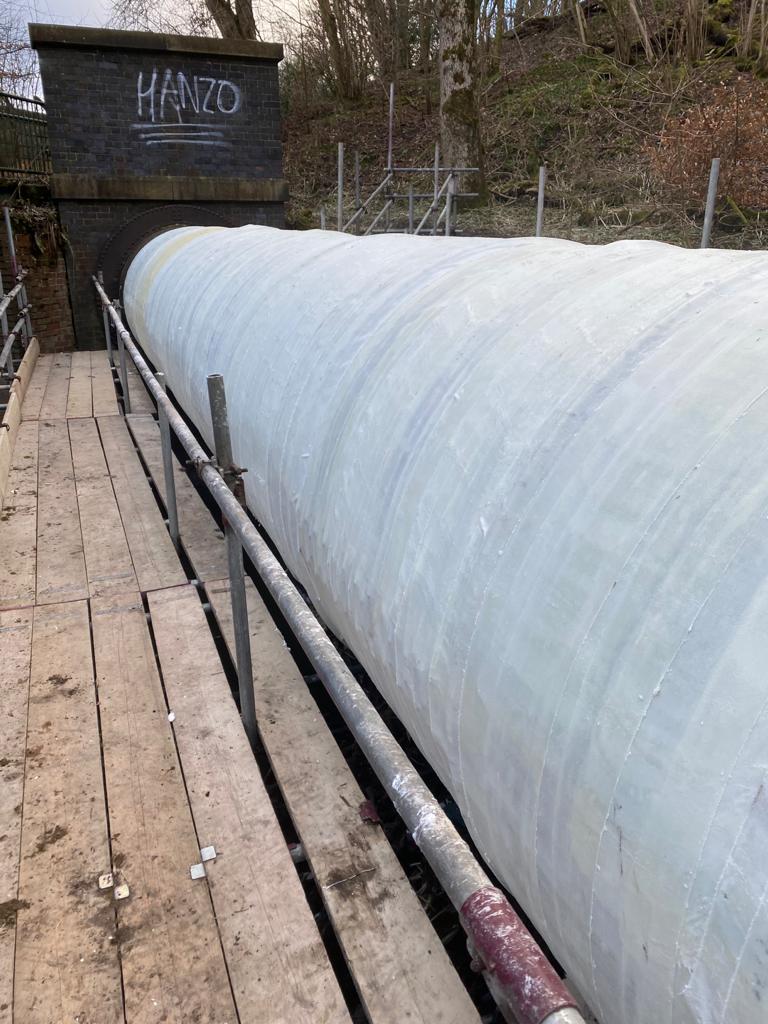 Pipe bridge encompassed with SylWrap HD Pipe Repair Bandage