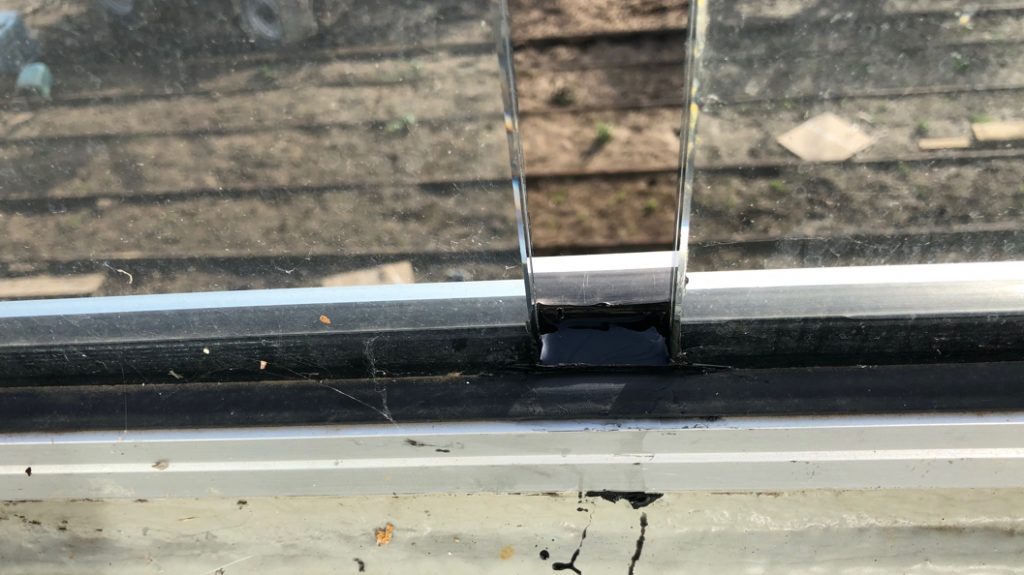 Liquid Rubber Elastomer Compound poured into the gap left for glass expansion to seal against water at a home in Essex