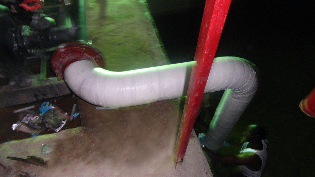 Two 90 degree elbow bends in a pipeline supplying water to a fire station undergo reinforcement with a SylWrap HD Pipe Repair Bandage