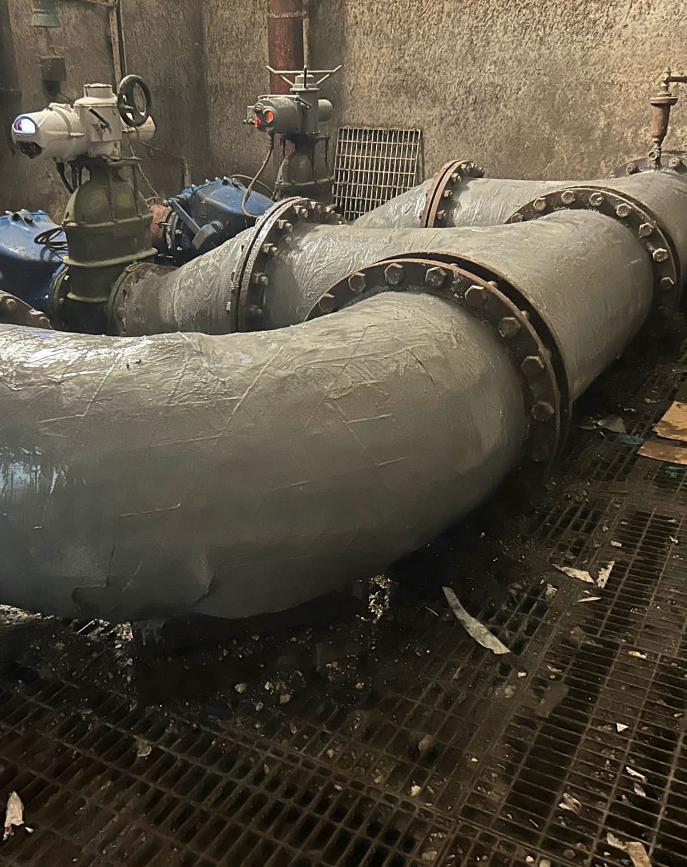 Liquid Metal and SylWrap Bandage used to give a ductile pipe system in an underground pumping station corrosion protection