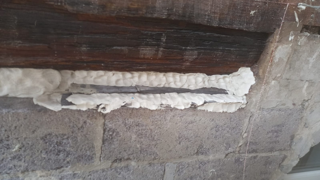 Sylmasta AB Original Epoxy Putty used to fill in gaps in a rotted wood beam