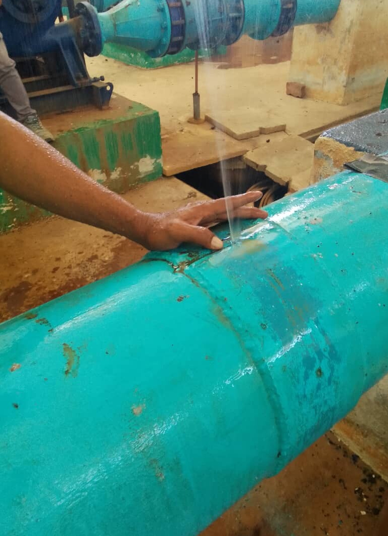 A 6 bar live leak at a water treatment plant in Malaysia before undergoing repair using a SylWrap Pipe Repair Contractor Case