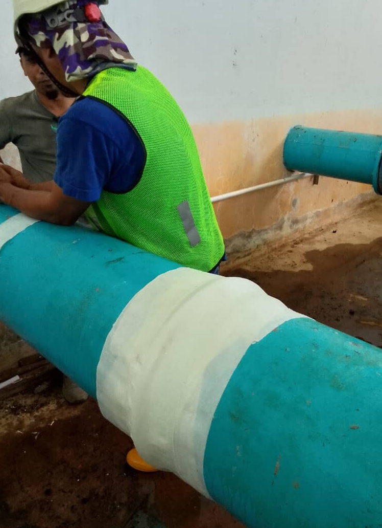Wrap & Seal and SylWrap Pipe Repair Bandage combined to seal a 6 bar live leak on a 300mm steel pipe at a water treatment plant in Malaysia