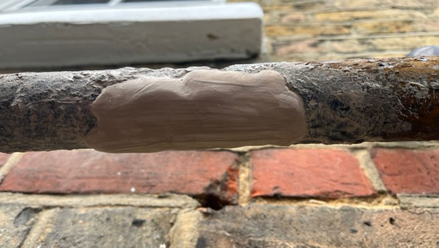 Superfast Aqua PW Epoxy Putty used to seal leaks in a shared water supply pipe repair