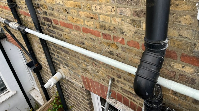 SylWrap Pipe Repair Bandage reinforces a shared water supply pipe in London left leaking and heavily damaged by corrosion