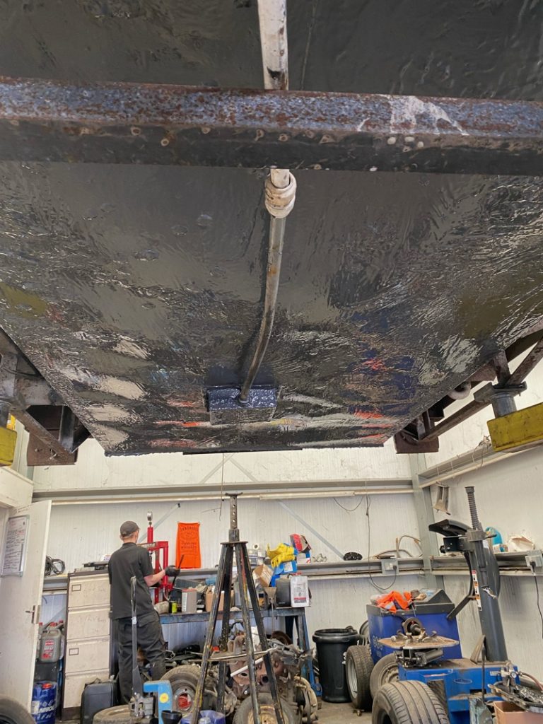 Wastewater tank reinforced during the repair of a portable toilet trailer