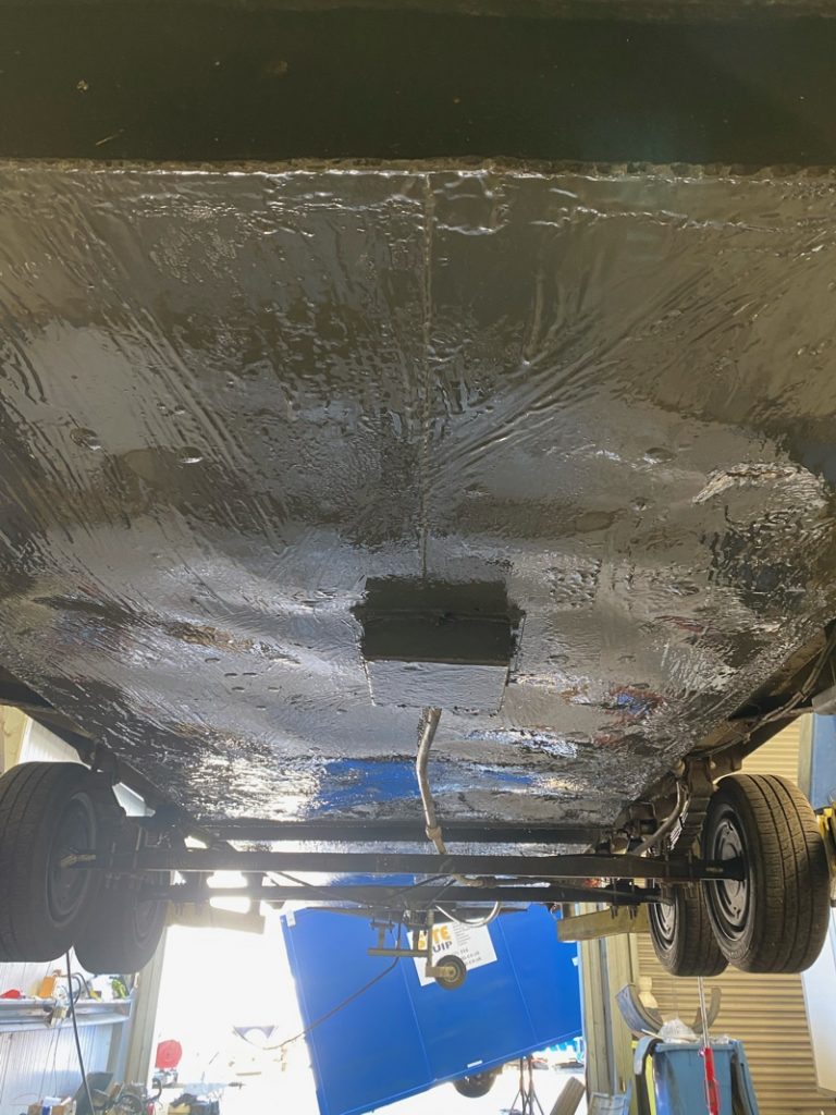 Liquid Metal Epoxy Coating applied to a portable toilet trailer during the repair of its wastewater holding tank