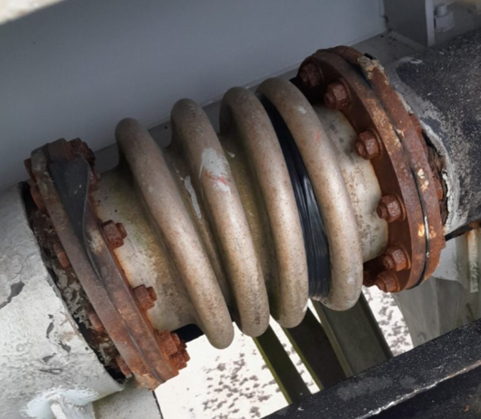 Completed repair of a leaking expansion joint on a 225mm steel water main pipe crossing a UK suspension bridge