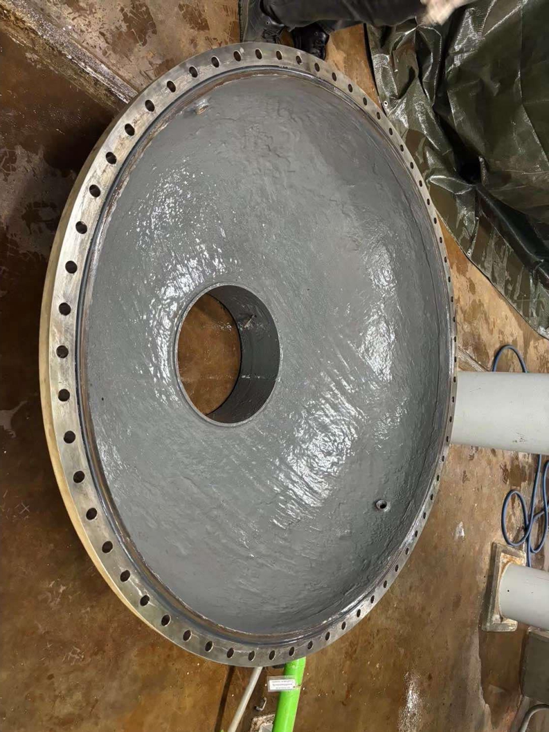 The inside of a heat exchanger water box after being given corrosion protection with Sylmasta Liquid Metal