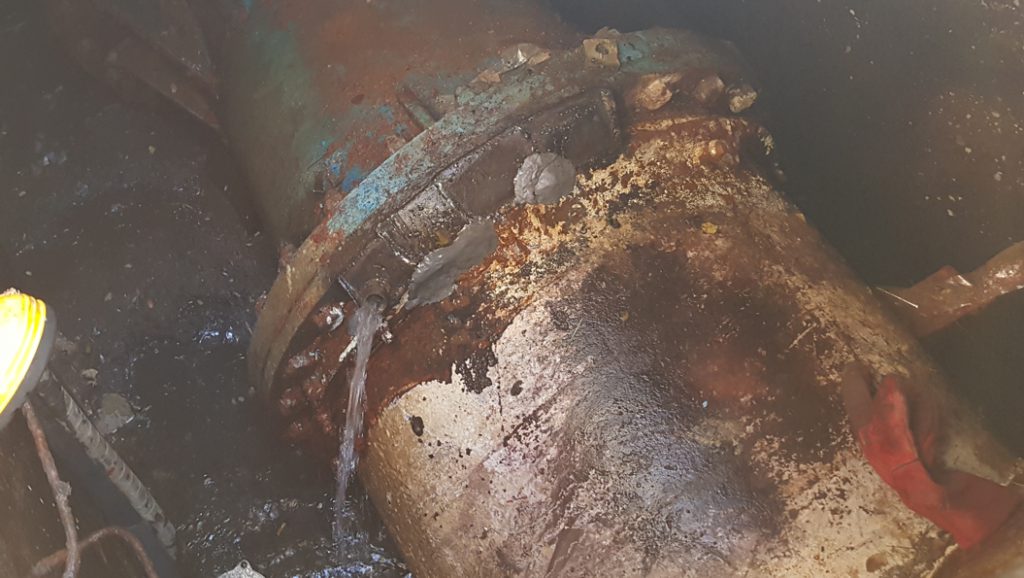 Completed repair of a 900mm steel water main in an underground chamber made using Superfast Steel and a valve