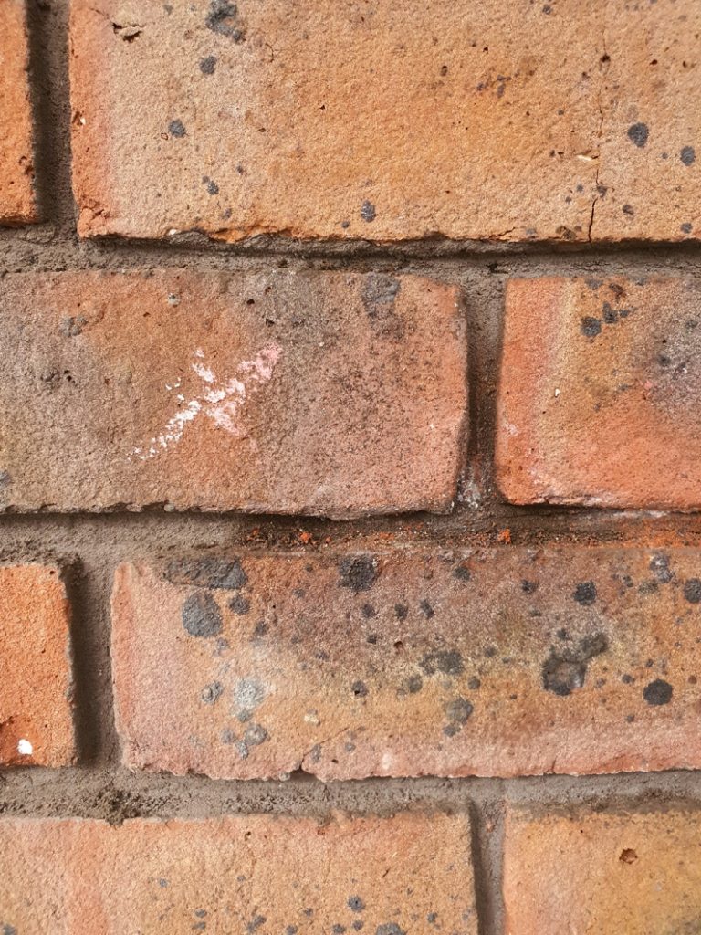 Brick restoration carried out by mixing Sylmasta AB Original Epoxy Putty with brick dust