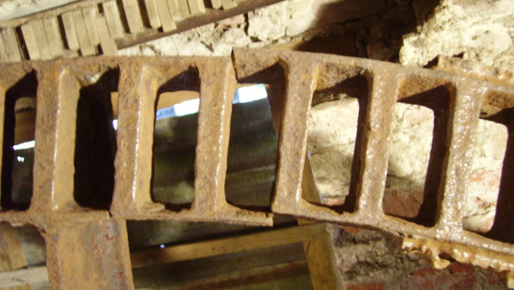 A cracked 19th century cast iron pit wheel prior to undergoing refurbishment and restoration by Sylmasta