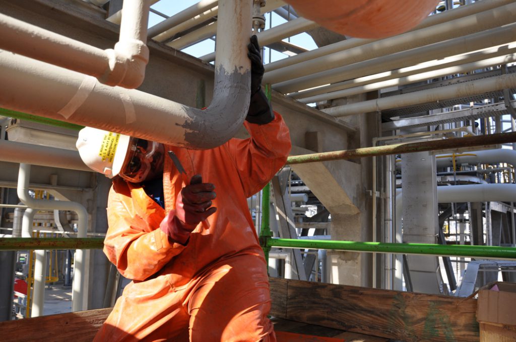 Industrial Metal Epoxy Repair paste used to rebuild a degraded sulphuric acid pipe line in Saudi Arabia