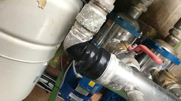 Wrap & Seal Pipe Repair Tape applied to a leaking pipe in a CHP Plant 