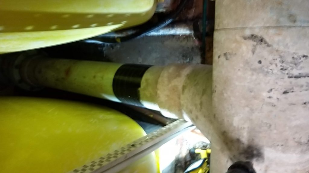 Wrap & Seal Pipe Repair Tape used to make a live leak repair to a 50mm plastic pipe in a swimming pool filtration system