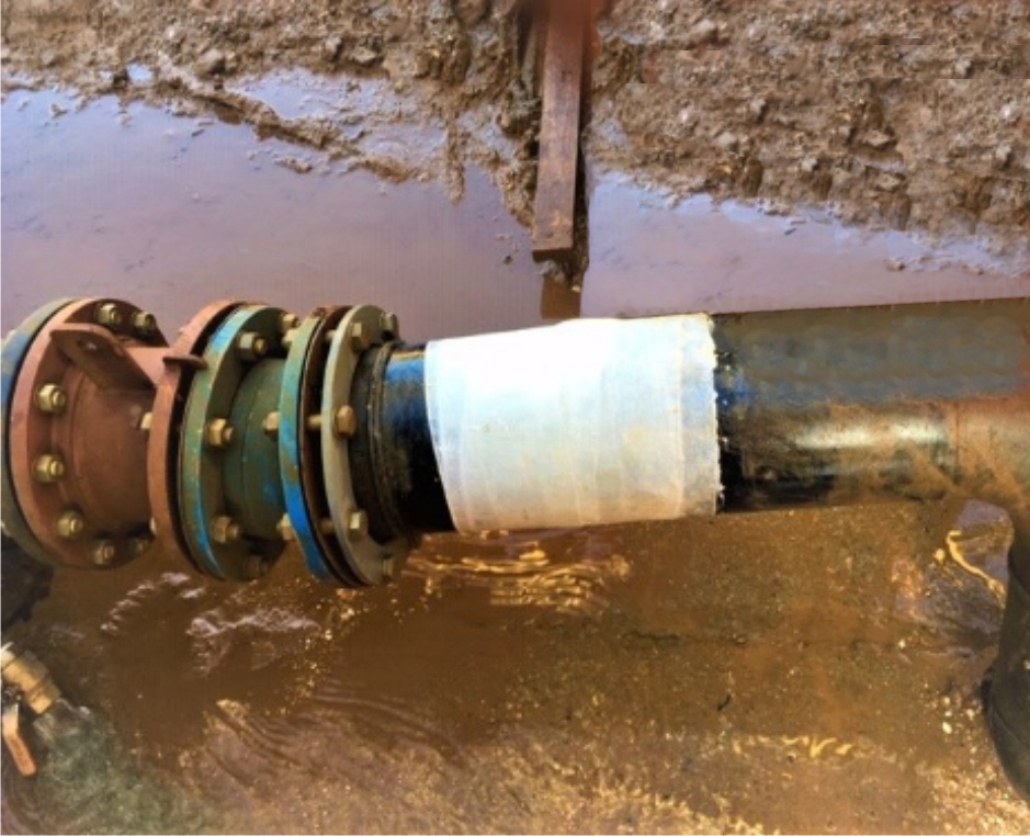 Pierced plastic pipe at a quarry wash plant sealed using a SylWrap Standard Pipe Repair Kit