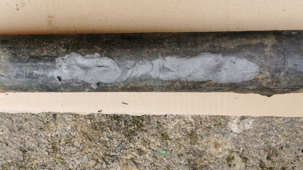 Superfast Steel Epoxy Putty used to seal a rupture in a water supply pipe prior to a reconnect to the network
