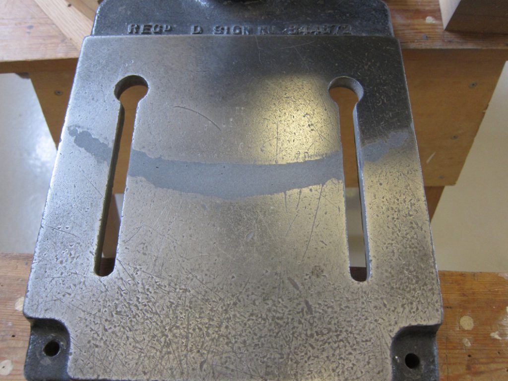 Drill base stand suffering from a deep gouge undergoes a rebuild and refurbish application with Industrial Metal Epoxy Paste