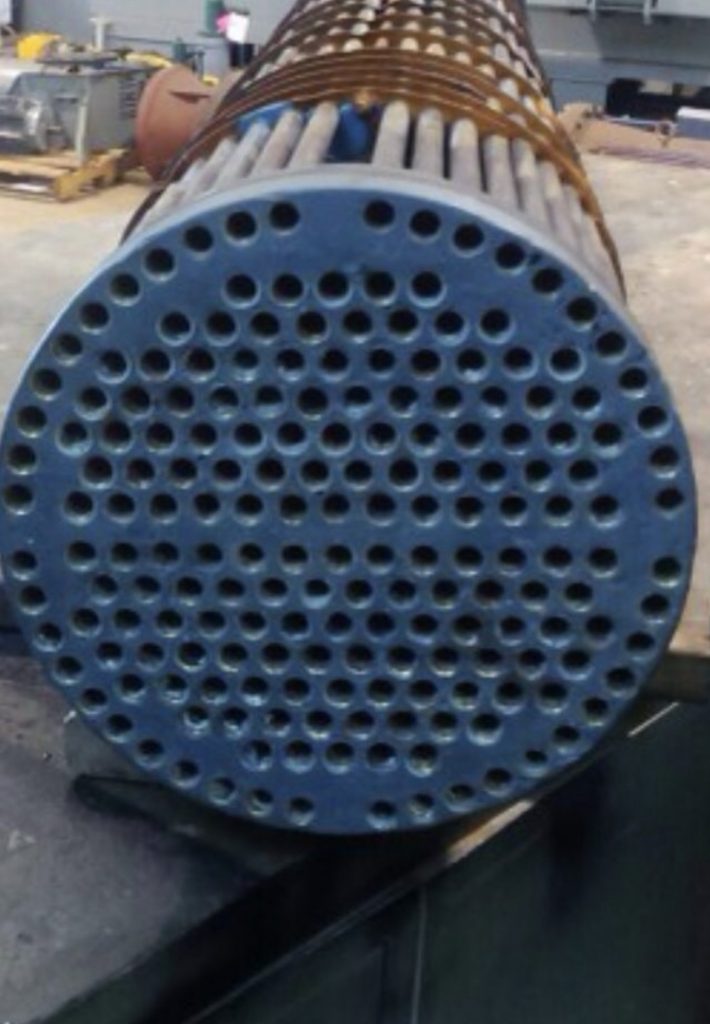 A heavily corroded cast iron face on a turbine cooler dispenser unit undergoes a rebuild using Ceramic Supergrade Epoxy Paste