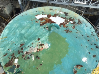 Tank suffering from corrosion undergoes repair using E190 Brushable Epoxy Resin and Fibreglass Tape