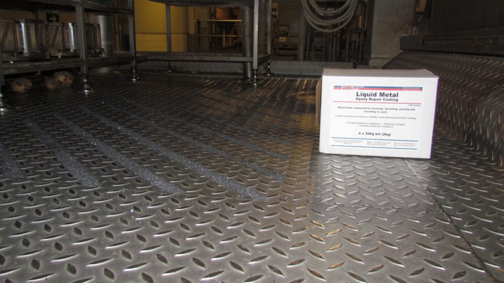 Liquid Metal Epoxy Coating combined with silicone carbide grit to create anti slip floor at PepsiCo Plant in Chile