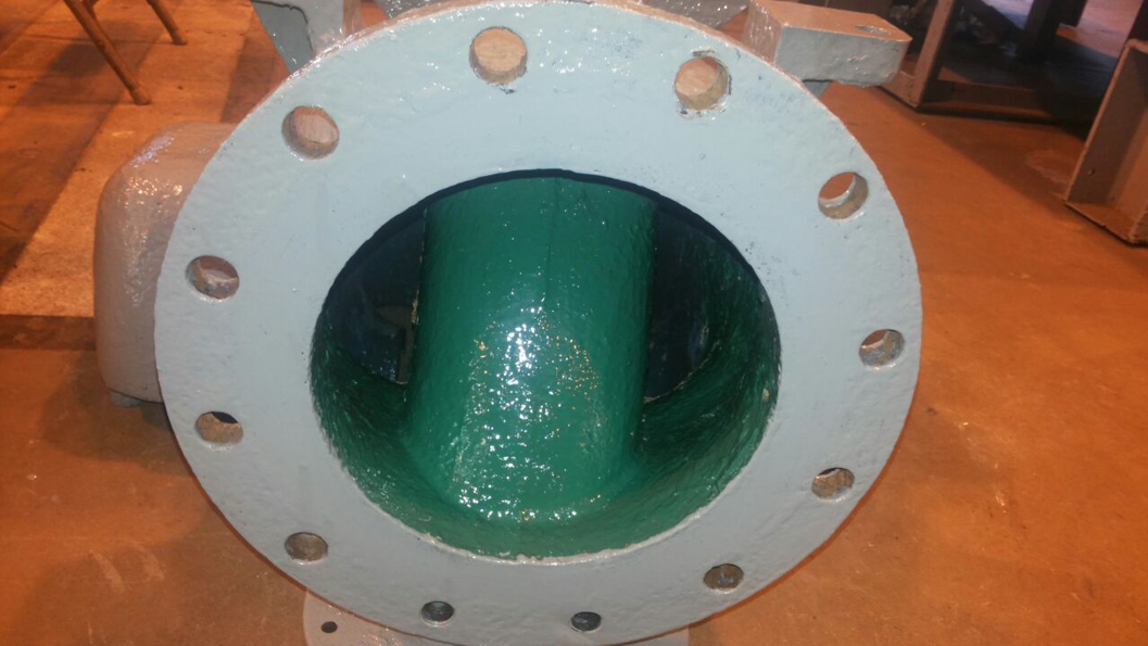 Ceramic Brushable Green Epoxy Coating is used to repair a worn pump extracting water from a well in Puerto Rico