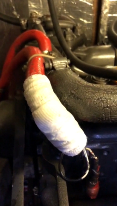 SylWrap HD Pipe Repair Bandage seals a pinhole leak in a rubber hose which cooled a boat engine