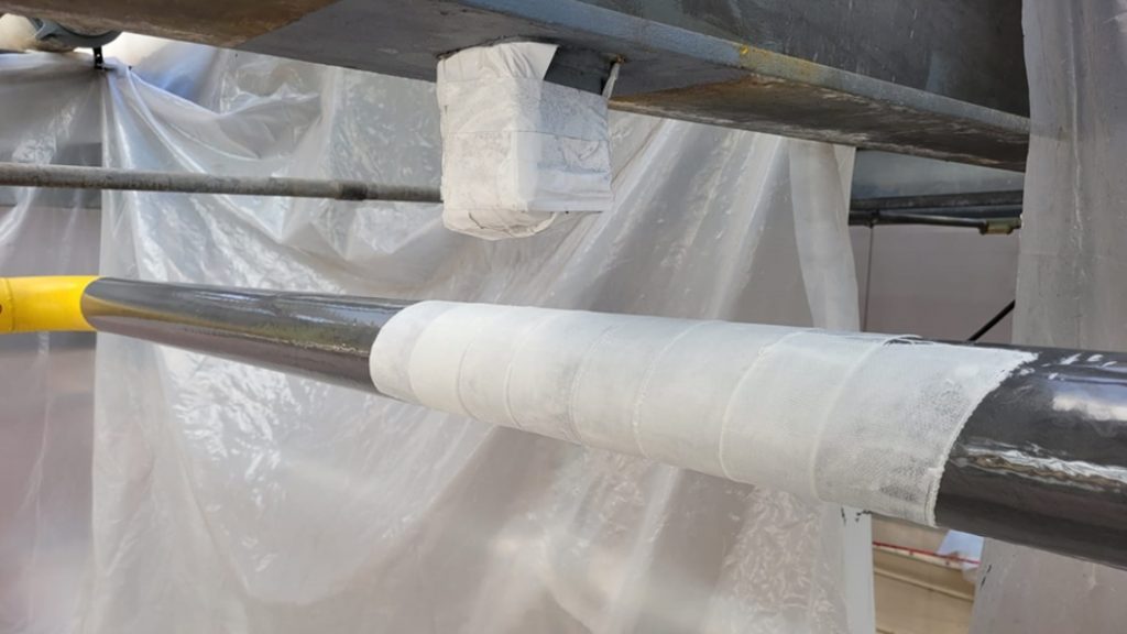 SylWrap HD reinforces a heavily corroded section of steel pipe