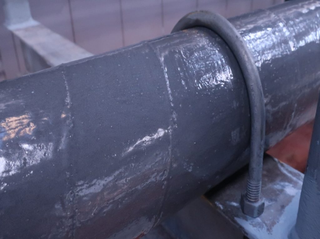 Liquid Metal and SylWrap HD repair a heavily corroded section of steel pipe carrying natural gas