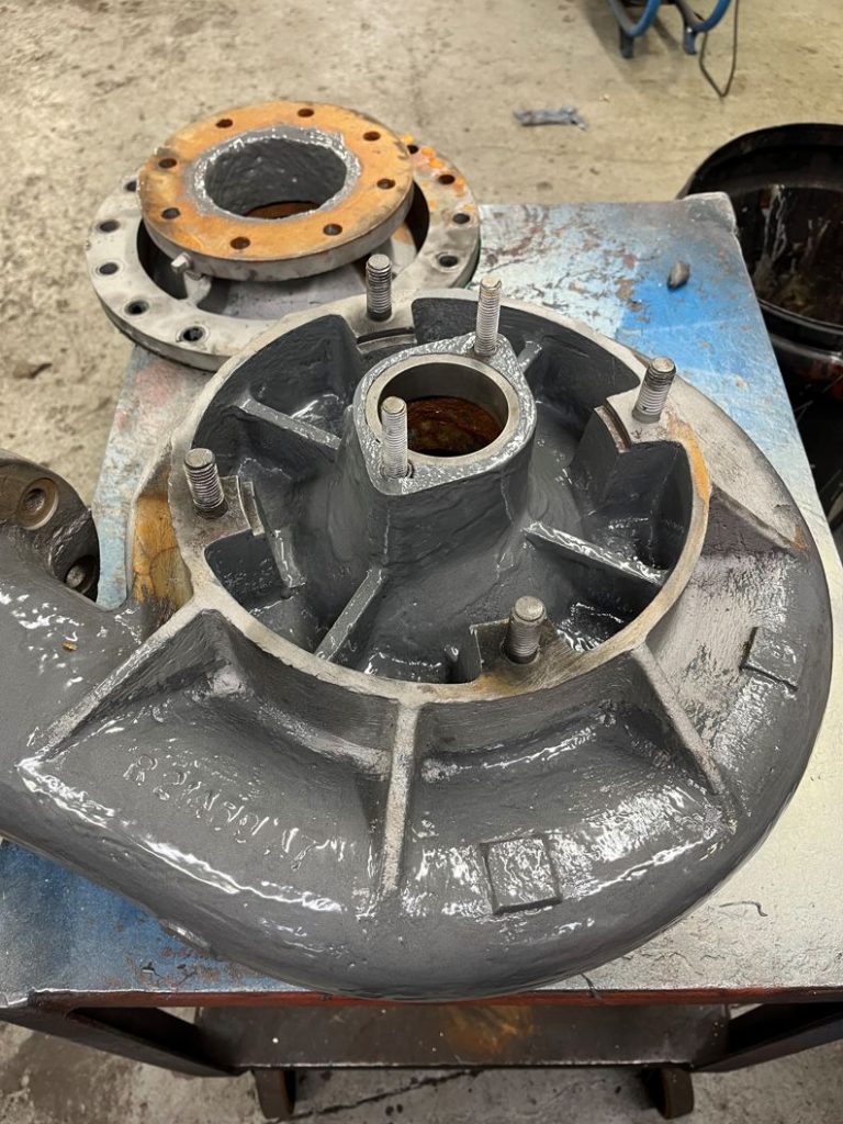 Live leak repair made to a stainless steel test pipe at Sylmasta HQ made using Wrap & Seal Pipe Burst Tape