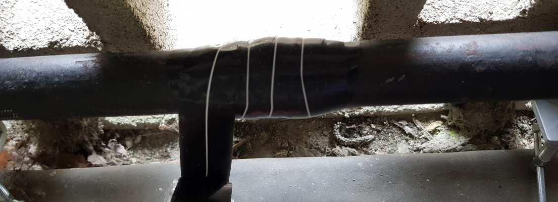 Wrap & Seal Pipe Burst Tape used in a successful repair to a leaking malleable iron water supply pipe at a UK home