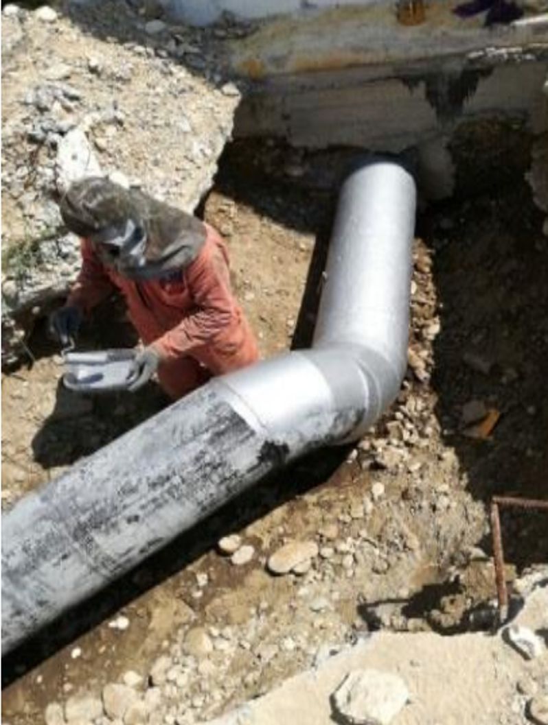 Liquid Metal Epoxy Coating is brush applied to a steel pipe during a major repair programme at a wastewater treatment plant in Mexico