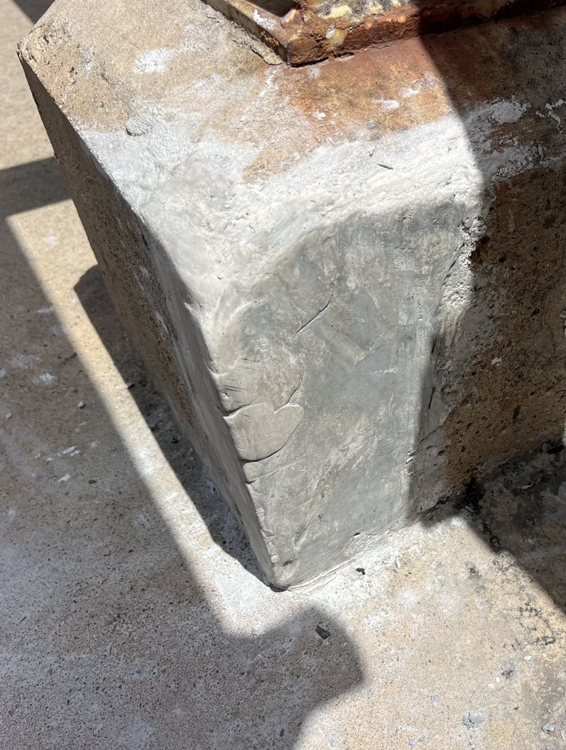 Damaged concrete footing at a mine in Australia after repair with Sylmasta AB Original Epoxy Putty